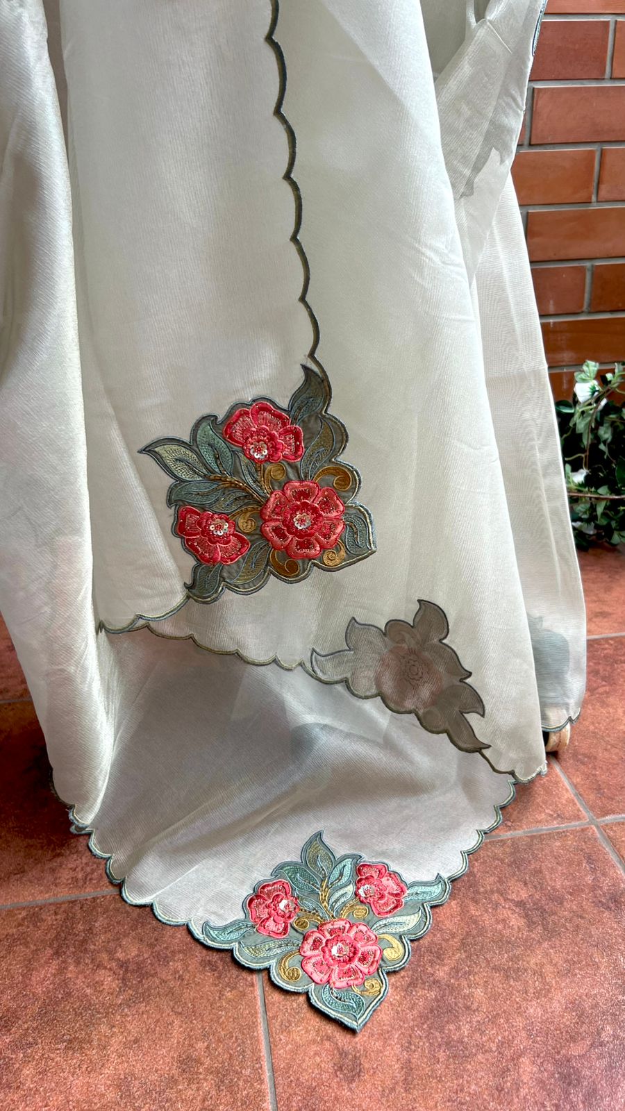 Half white textured organza saree with heavy handwork blouse