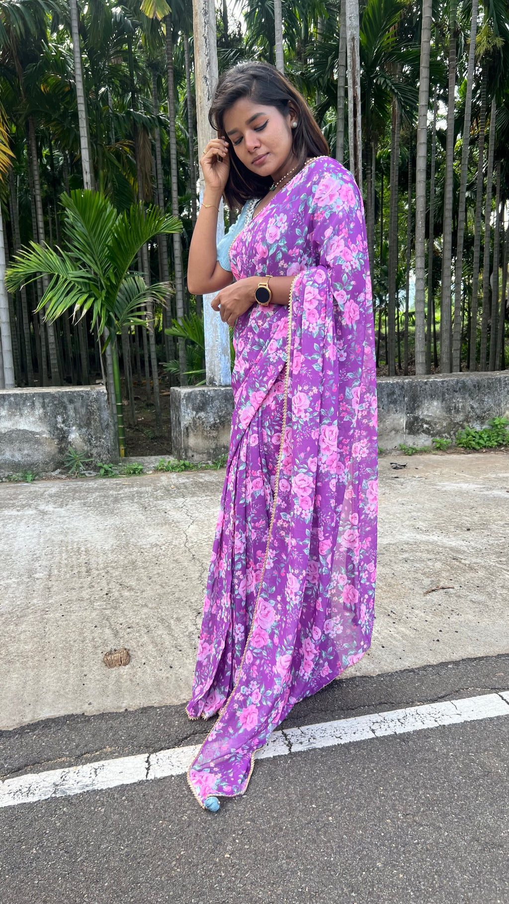 Purple floral georgette saree with hand worked blouse