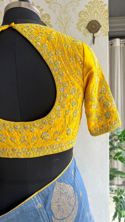 Blue banarasi silk saree with yellow embroidery blouse