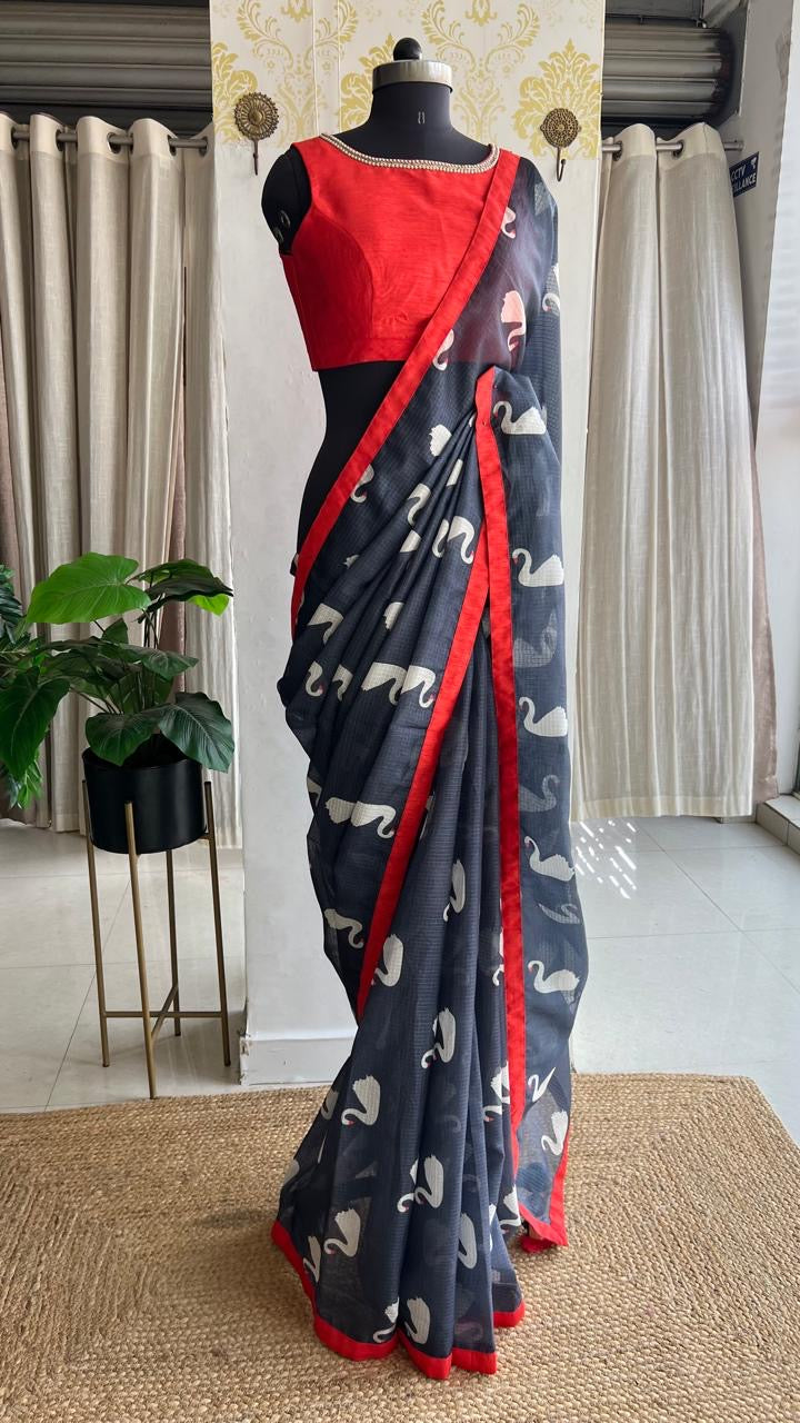 Grey kota doria saree with reddish hand worked blouse