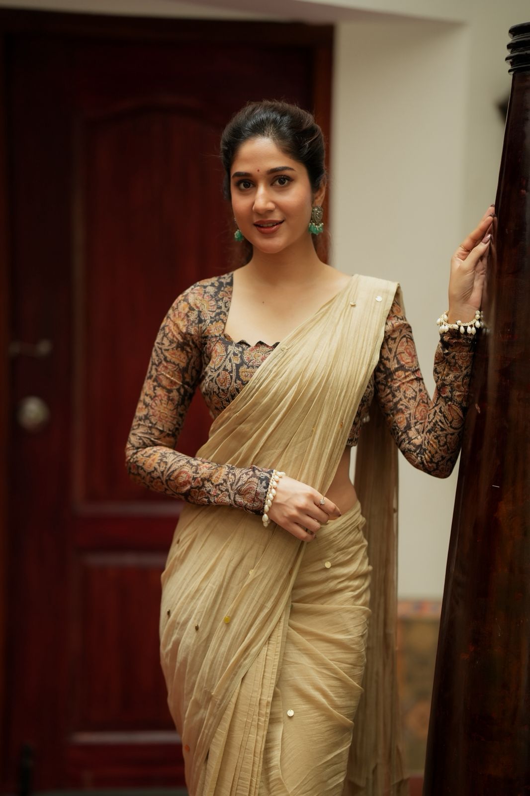 Cream malai chanderi saree with Ajrak print blouse