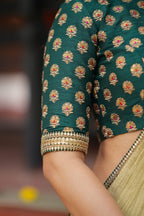 Gold tissue saree with green hand work blouse