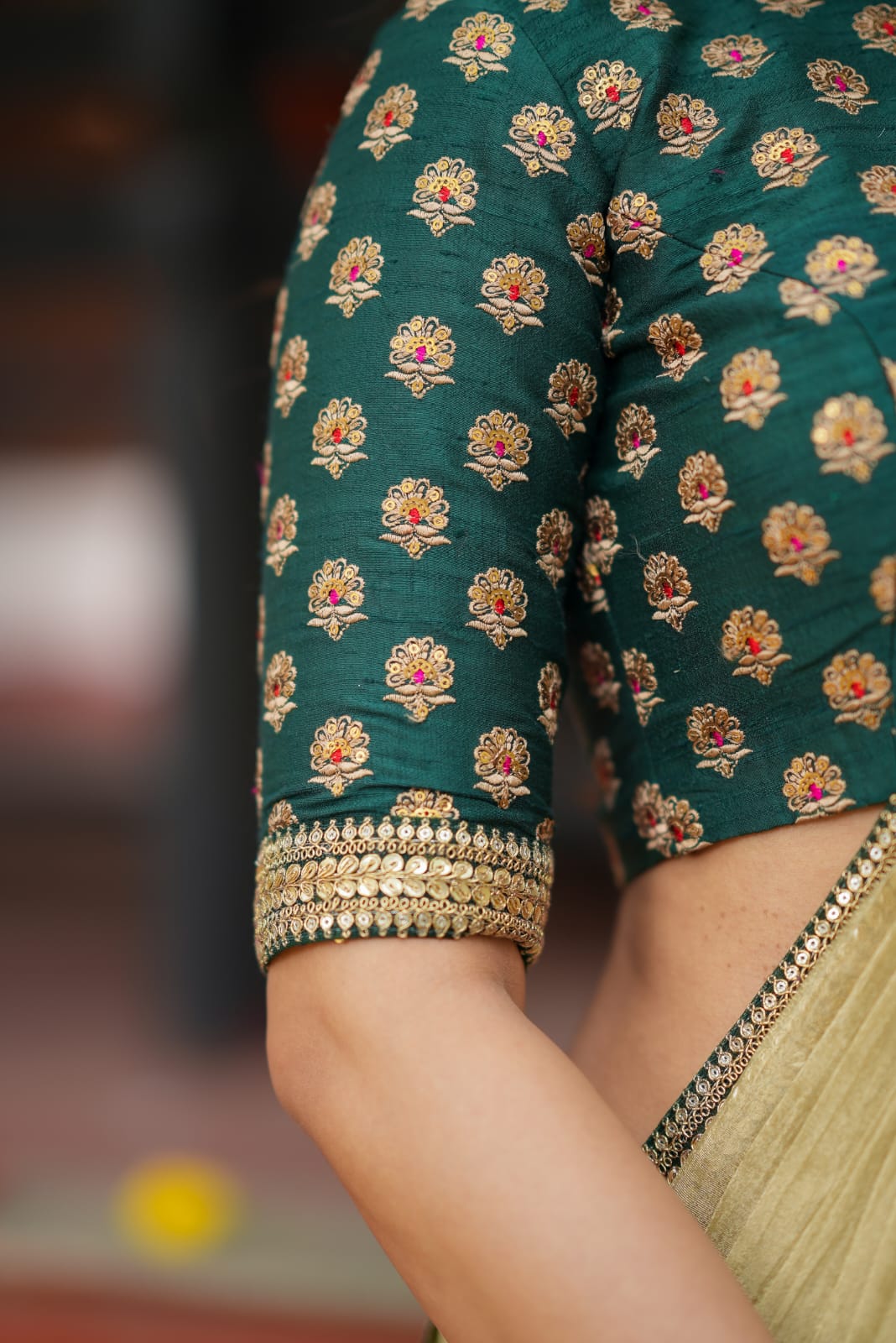 Gold tissue saree with green hand work blouse
