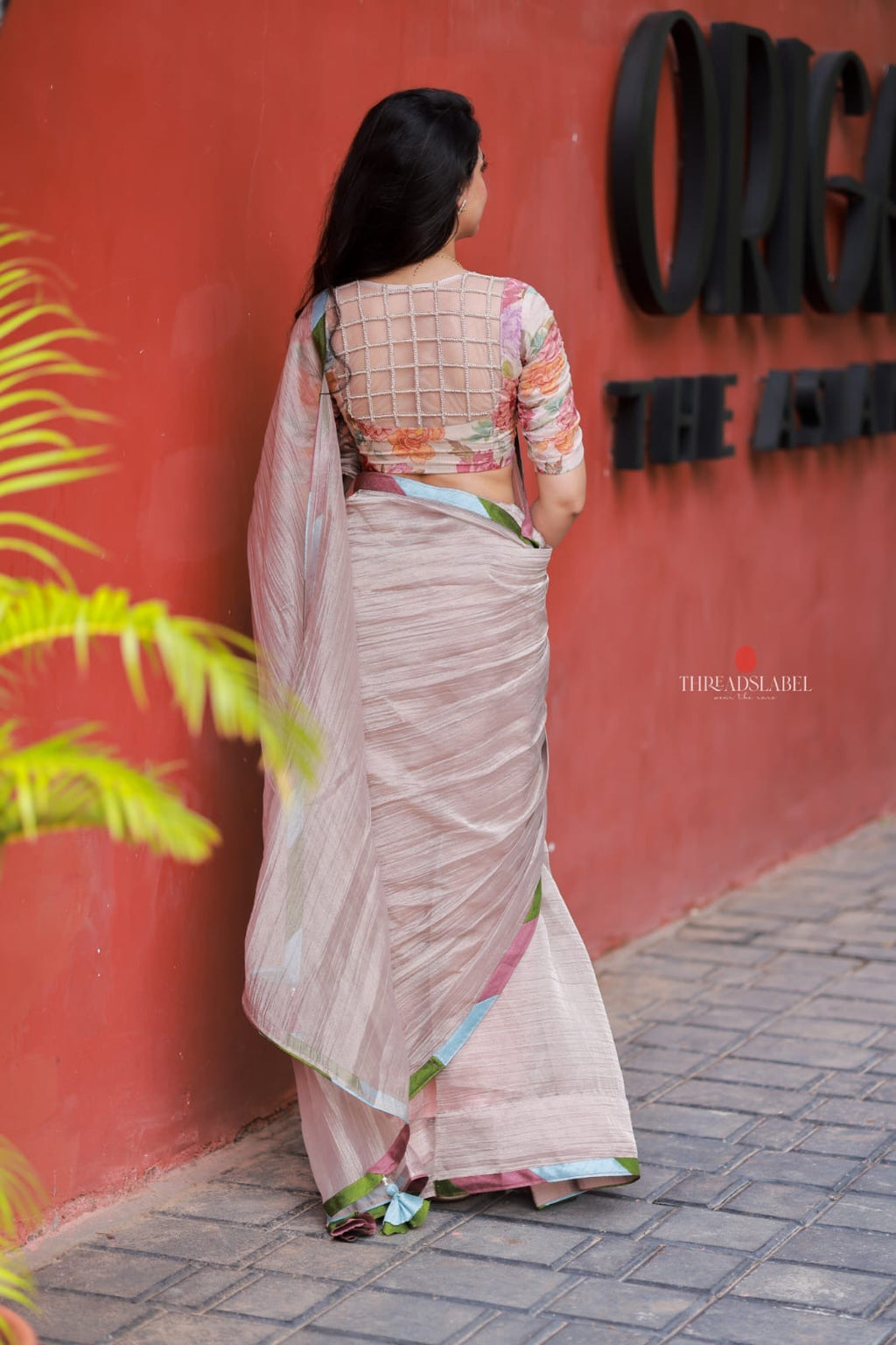 Dusty silver tissue saree with pearl hand work blouse