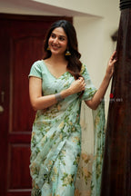 Sea green viscose jute floral saree (only saree)