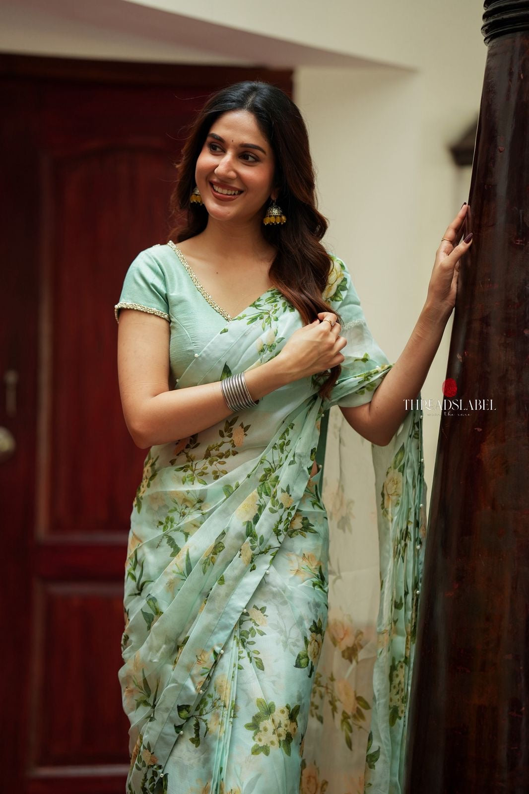 Sea green viscose jute floral saree (only saree)