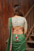 Green mul chanderi saree with halfwhite embroidery blouse