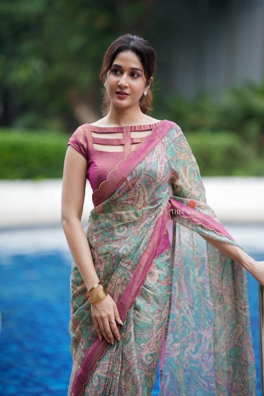 Jade green viscose jute saree with pink tissue blouse