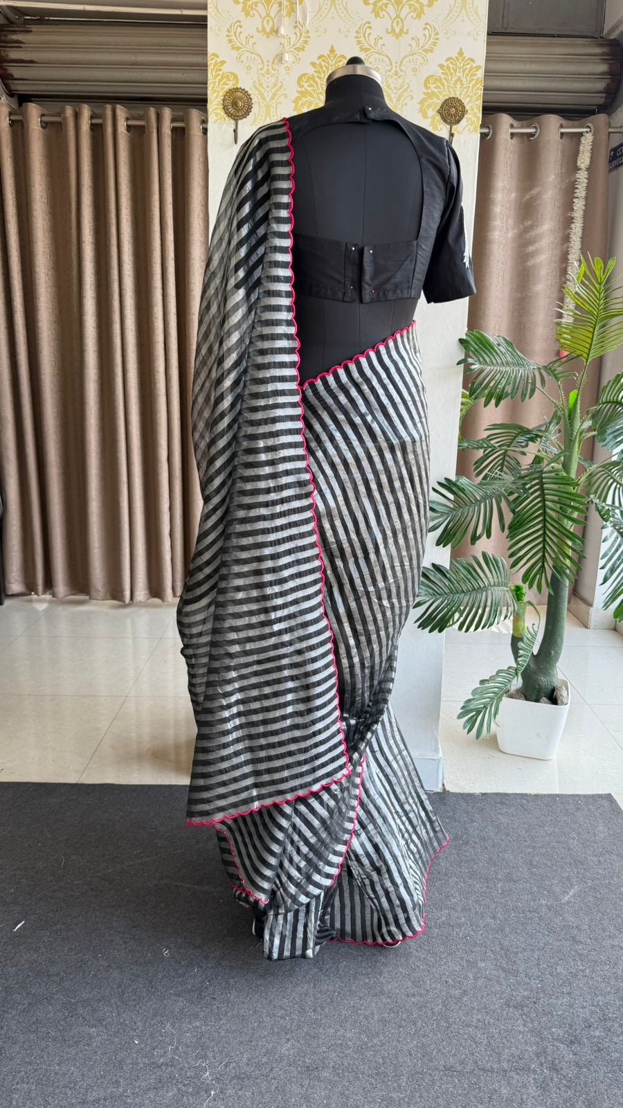 Black & silver stripped tissue saree with bird work blouse