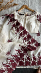 Cream kota cotton saree with mirror work blouse