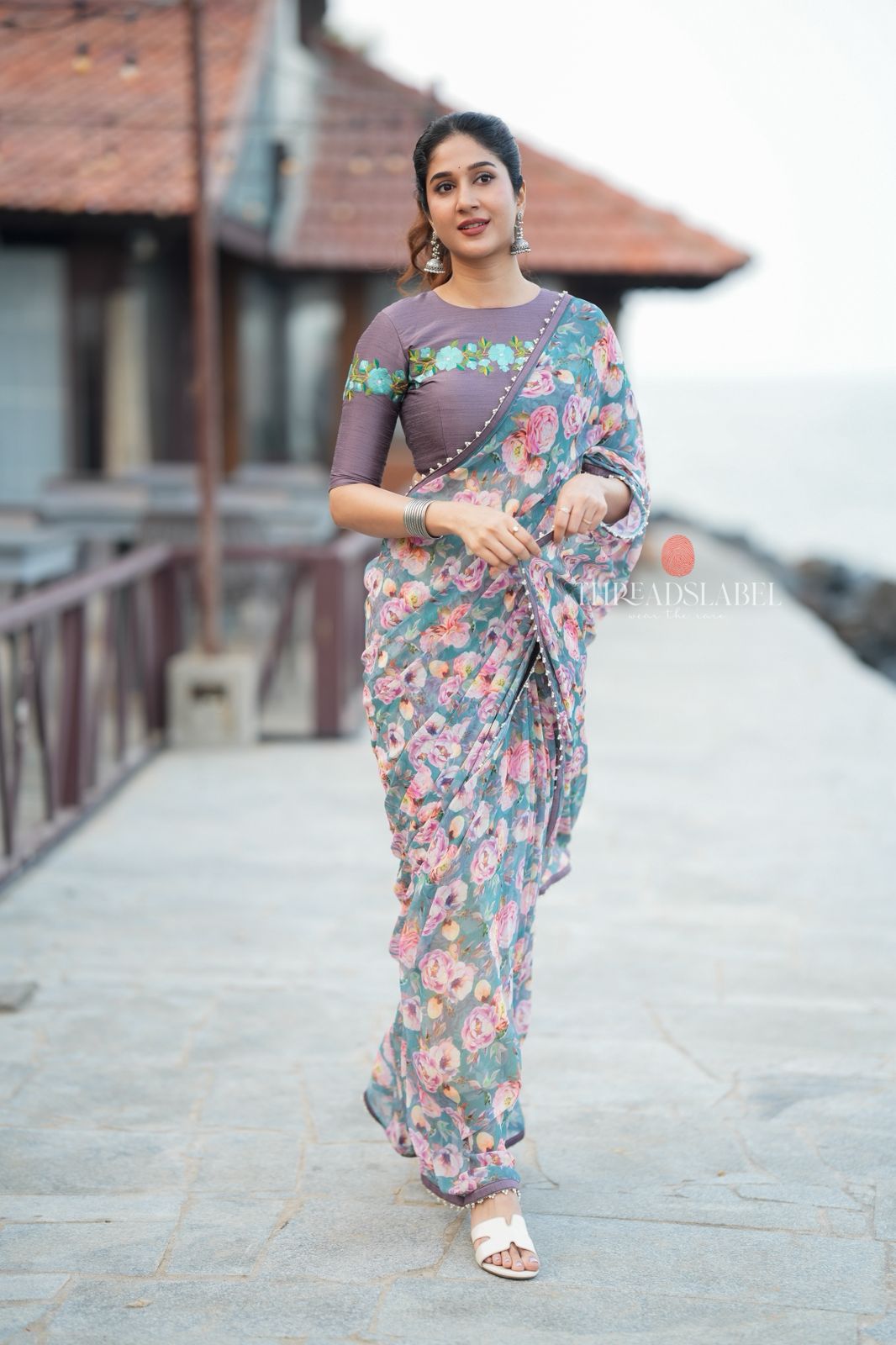 Blue floral georgette saree with grey embroidery blouse