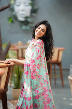 Pista floral organza saree with hand work blouse