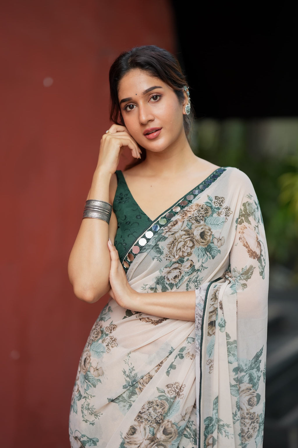 Half white chiffon floral saree with hand work blouse