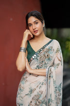 Half white chiffon floral saree with hand work blouse