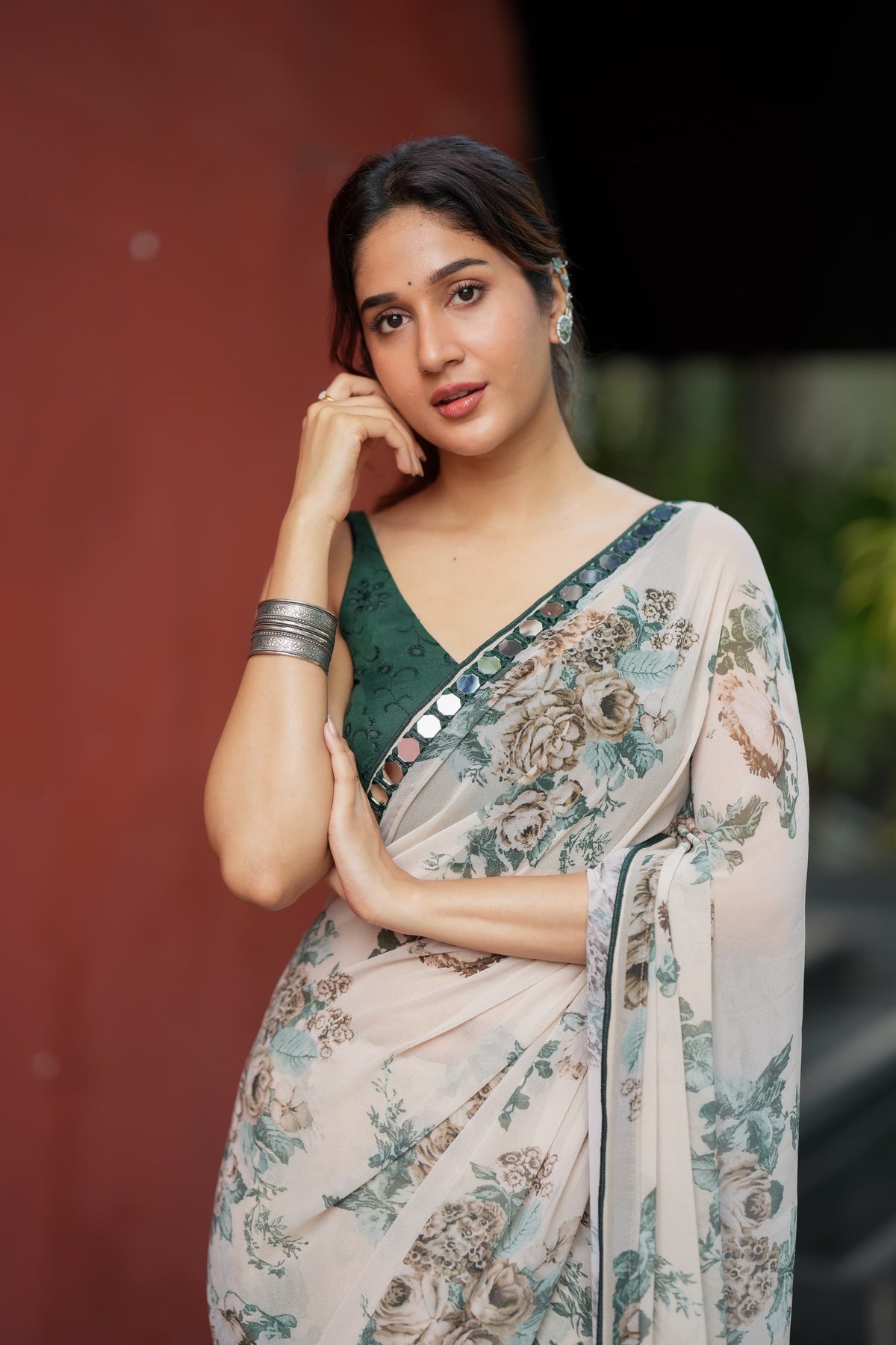 Half white chiffon floral saree with hand work blouse