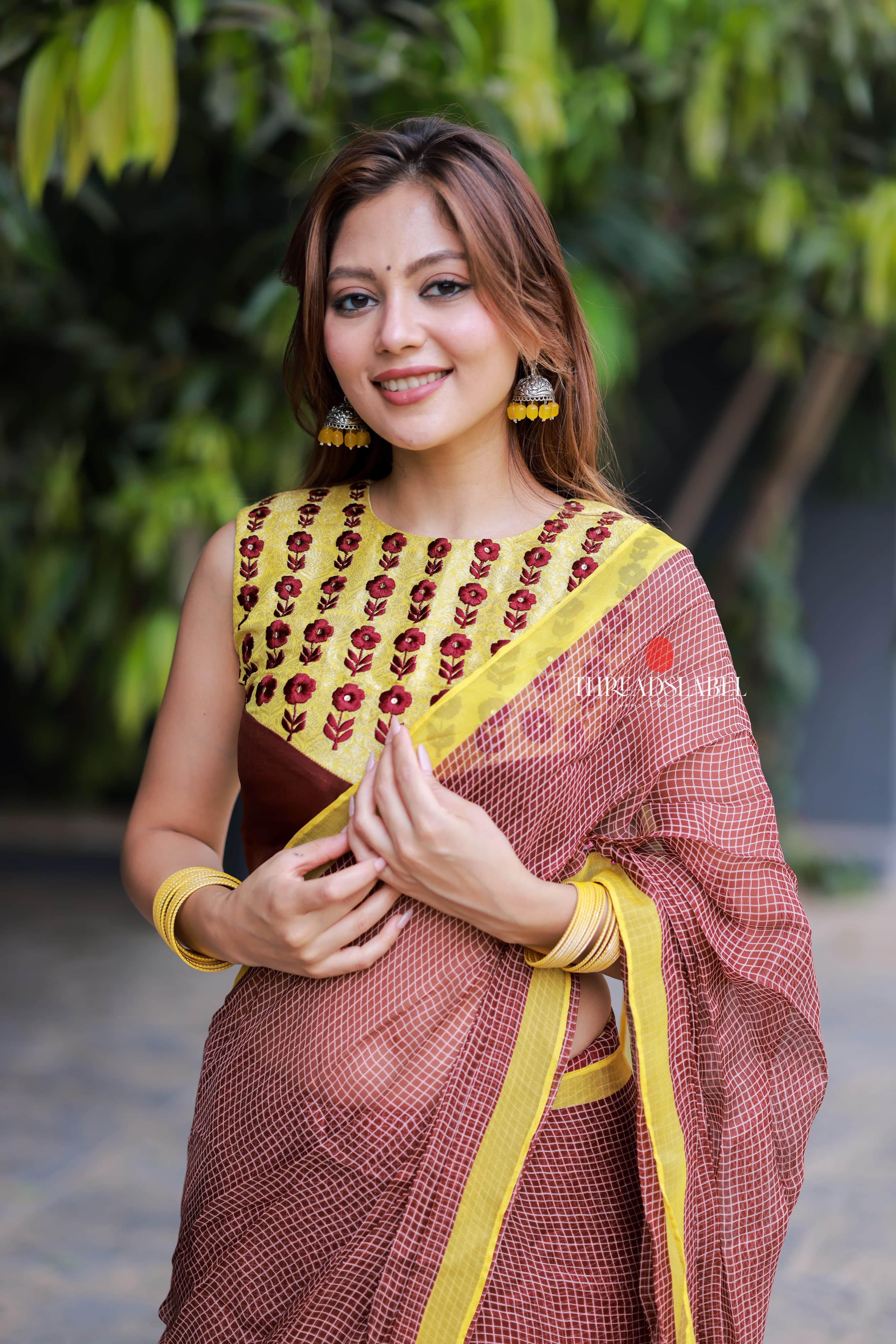 Brown jute saree with banarasi hand work blouse