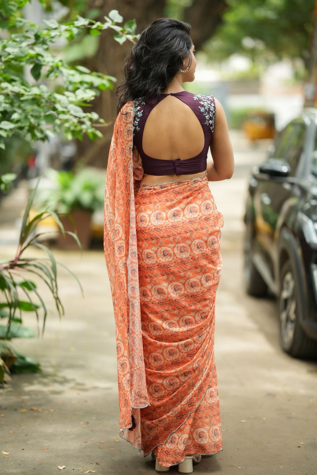 Pastel peach chiffon saree with brown hand work blouse
