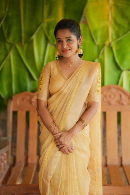 Gold kota doria saree with hand work blouse