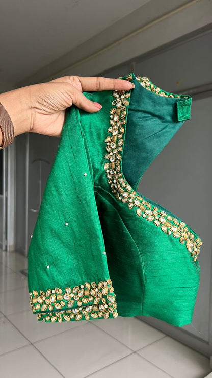 Red tissue saree with green hand work blouse