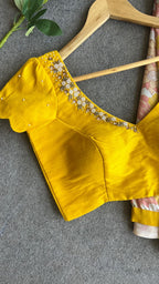 Yellow viscose floral saree with hand worked blouse