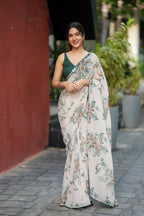 Half white chiffon floral saree with hand work blouse