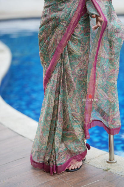 Jade green viscose jute saree with pink tissue blouse