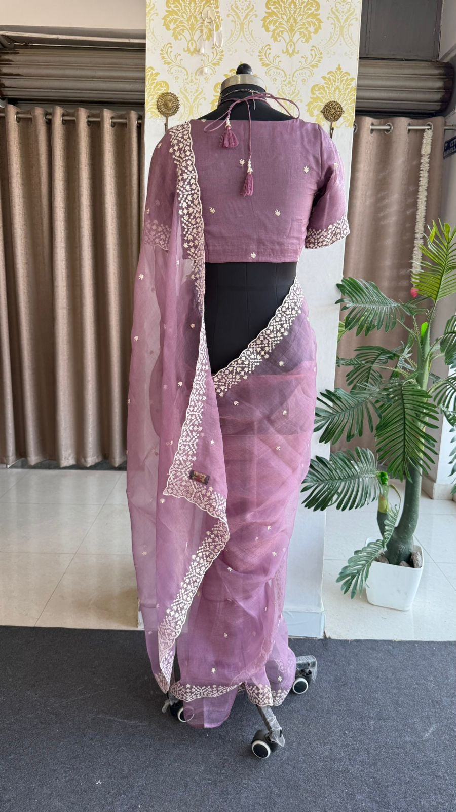 Lavender tissue saree with tissue embroidery blouse