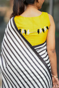 Black & white striped kossa saree with yellow embroidery blouse