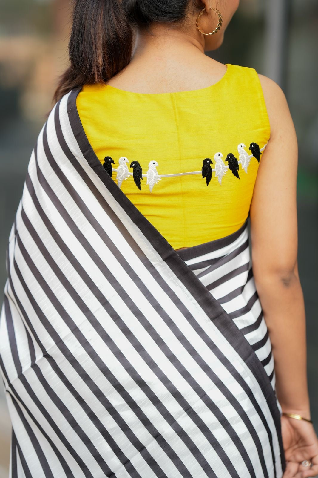 Black & white striped kossa saree with yellow embroidery blouse