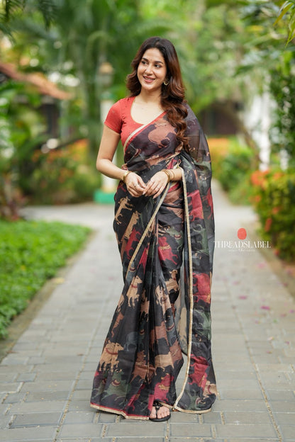 Black cow kota saree with paisley hand work blouse