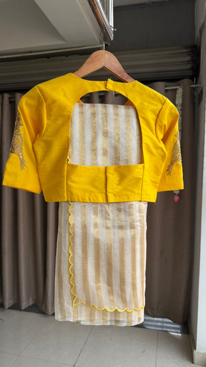 Yellow & cream stripped tissue saree with bird work blouse