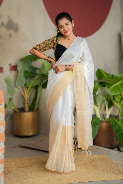 White soft tissue saree with heavy embroidery blouse