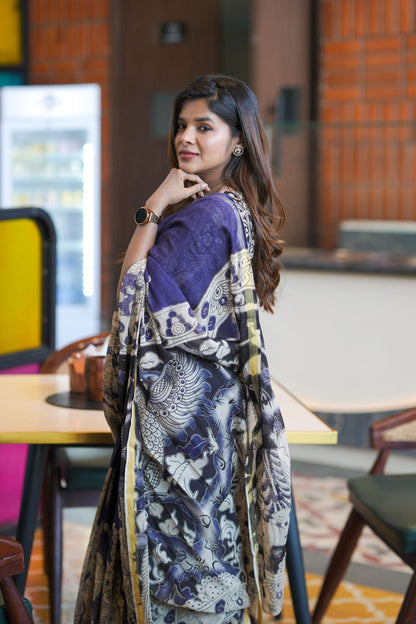 Purple kota saree with kalamkari work blouse