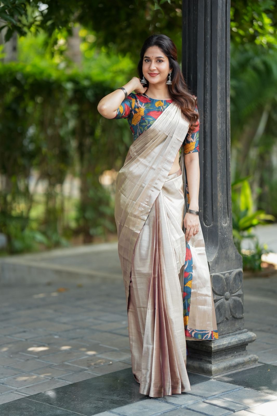 Silver soft tissue saree with blue kalamakari blouse