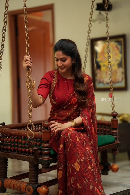 Maroon chiffon floral saree with hand work blouse