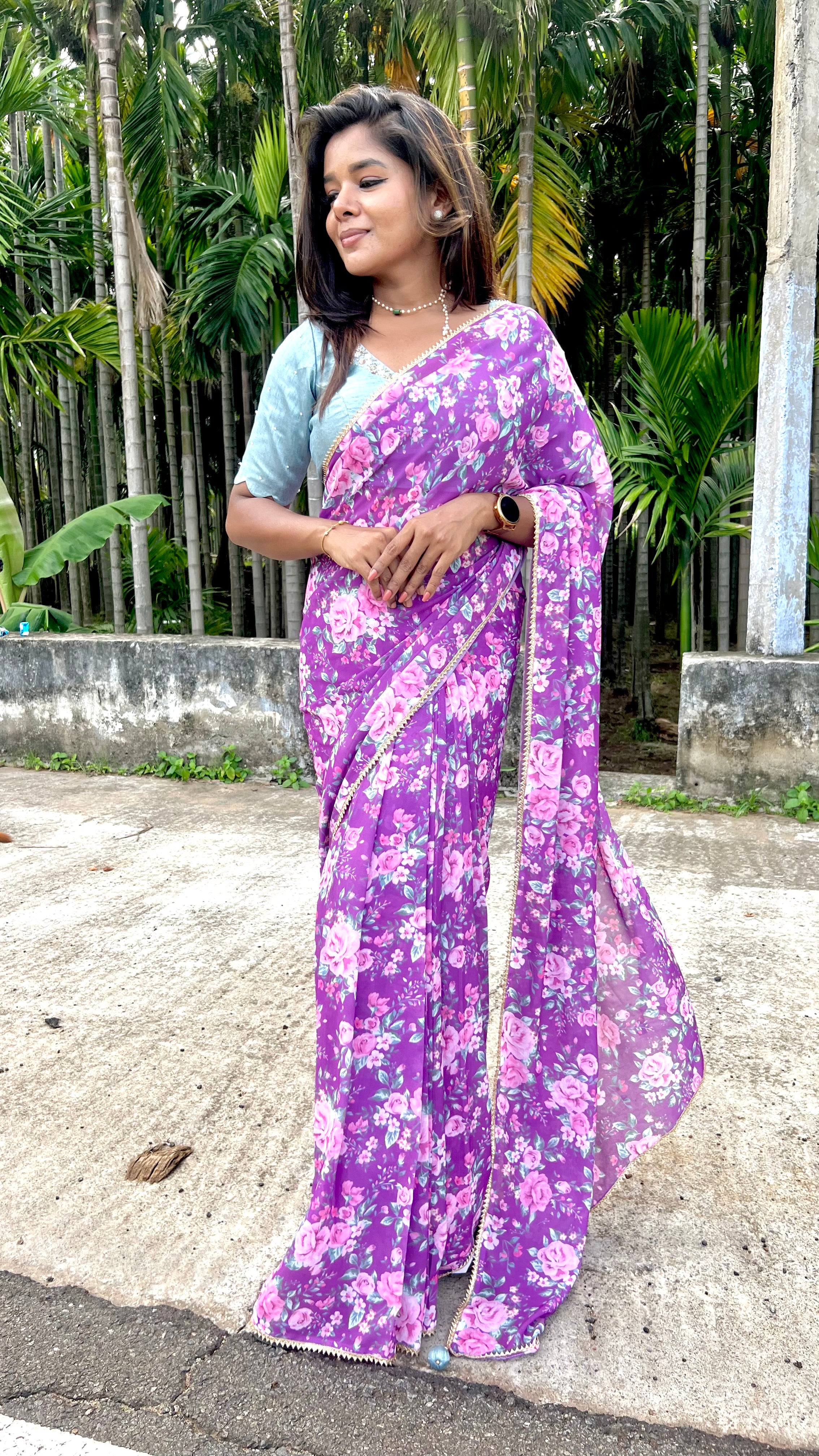 Purple floral georgette saree with hand worked blouse
