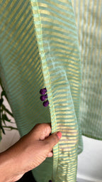 Green stripped tissue saree with purple floral hand work blouse