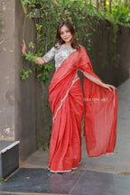 Orange rust saree with pearl work blouse