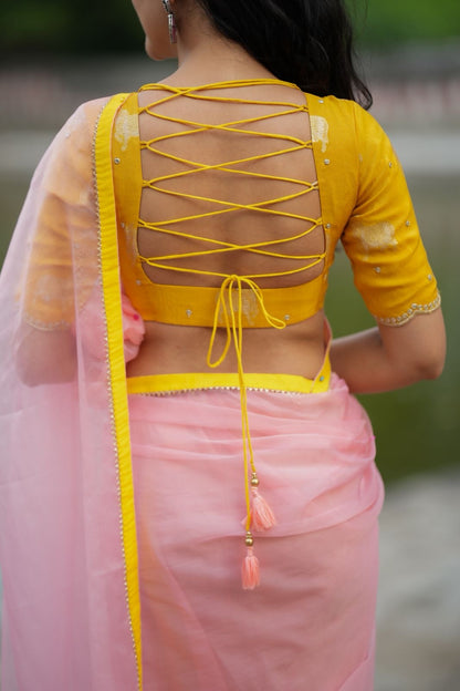 Peach organza saree with yellow hand work blouse
