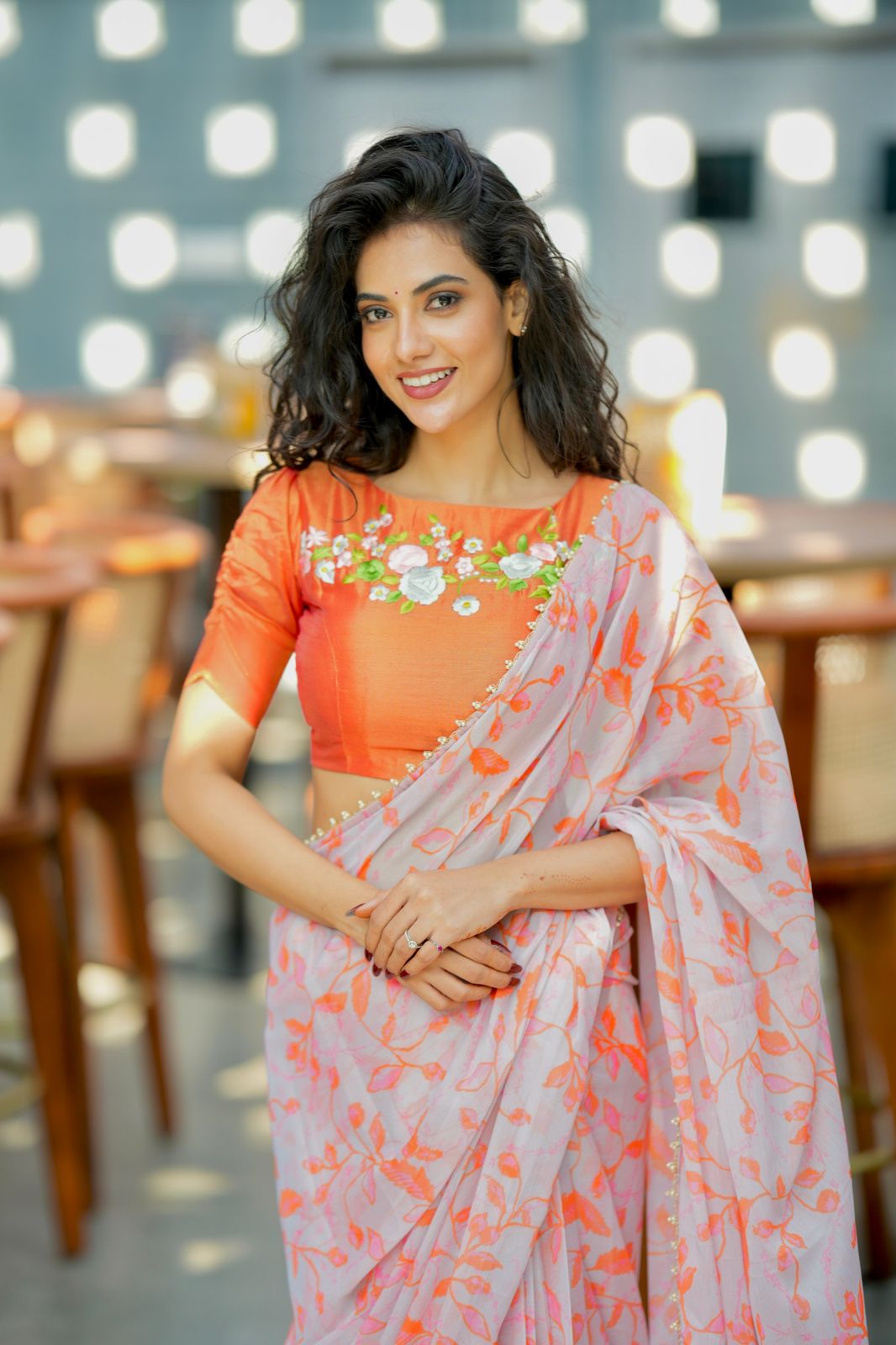 Reddish orange tissue floral hand work blouse(only blouse)