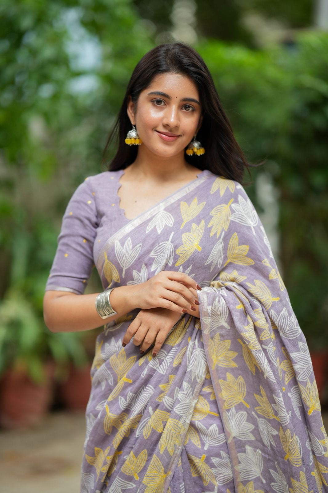 Lavender linen floral saree with hand work blouse