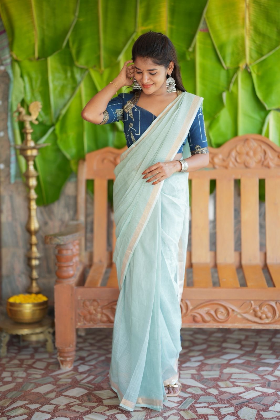 Aqua blue kota doria saree with hand work blouse