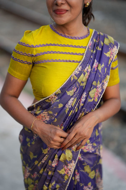 Blue floral tissue saree with lime hand work blouse