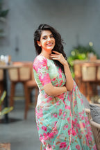 Pista floral organza saree with hand work blouse