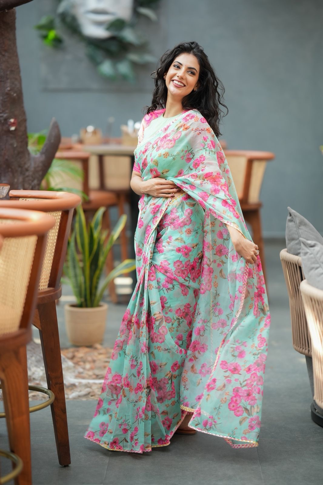 Pista floral organza saree with hand work blouse