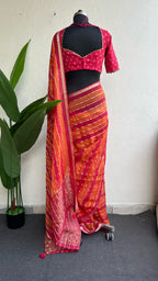 Pink & orange stripped soft organza saree with banarasi hand work blouse