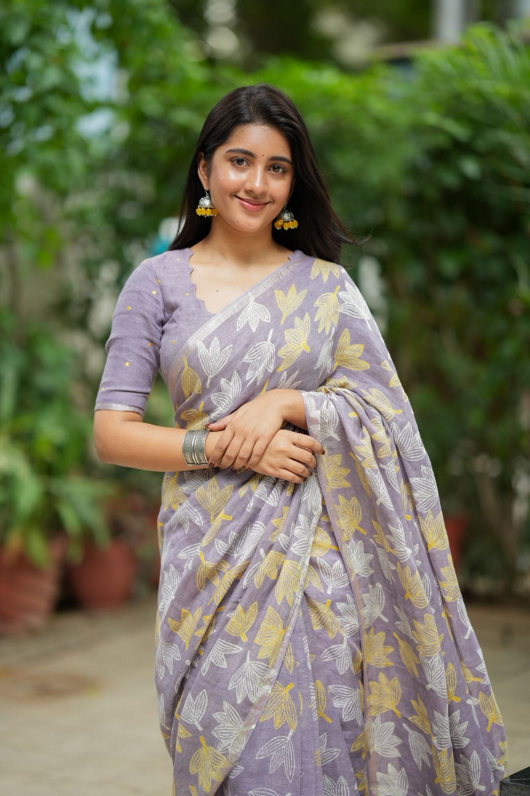 Lavender linen floral saree with hand work blouse