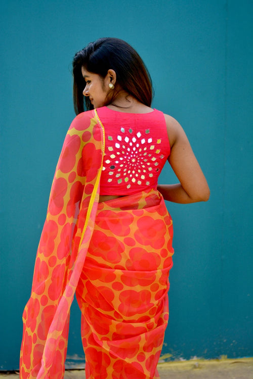 Pink & yellow floral organza saree with mirror hand work blouse