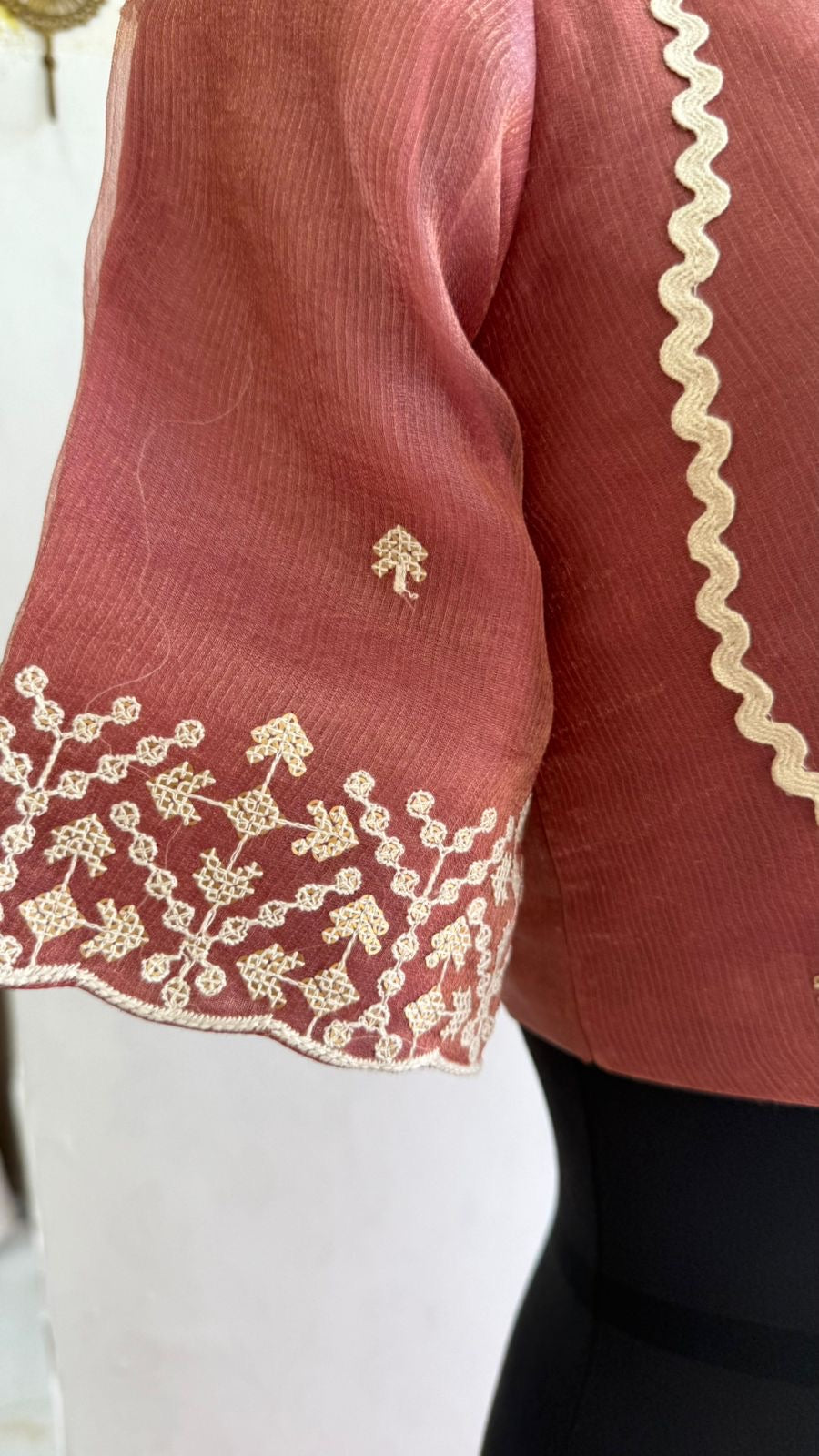 Peach tissue saree with tissue embroidery blouse