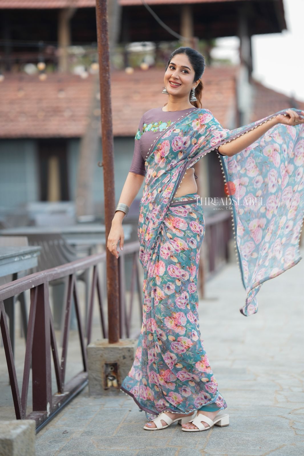Blue floral georgette saree with grey embroidery blouse